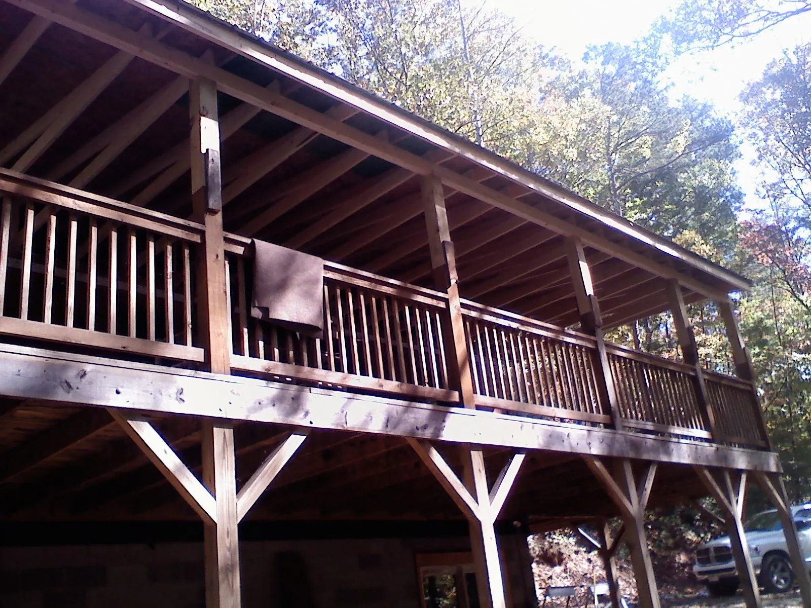 Timber framing under a new elevated porch and deck — Roof Leak Repair in Huntington Beach by Roofing Brothers